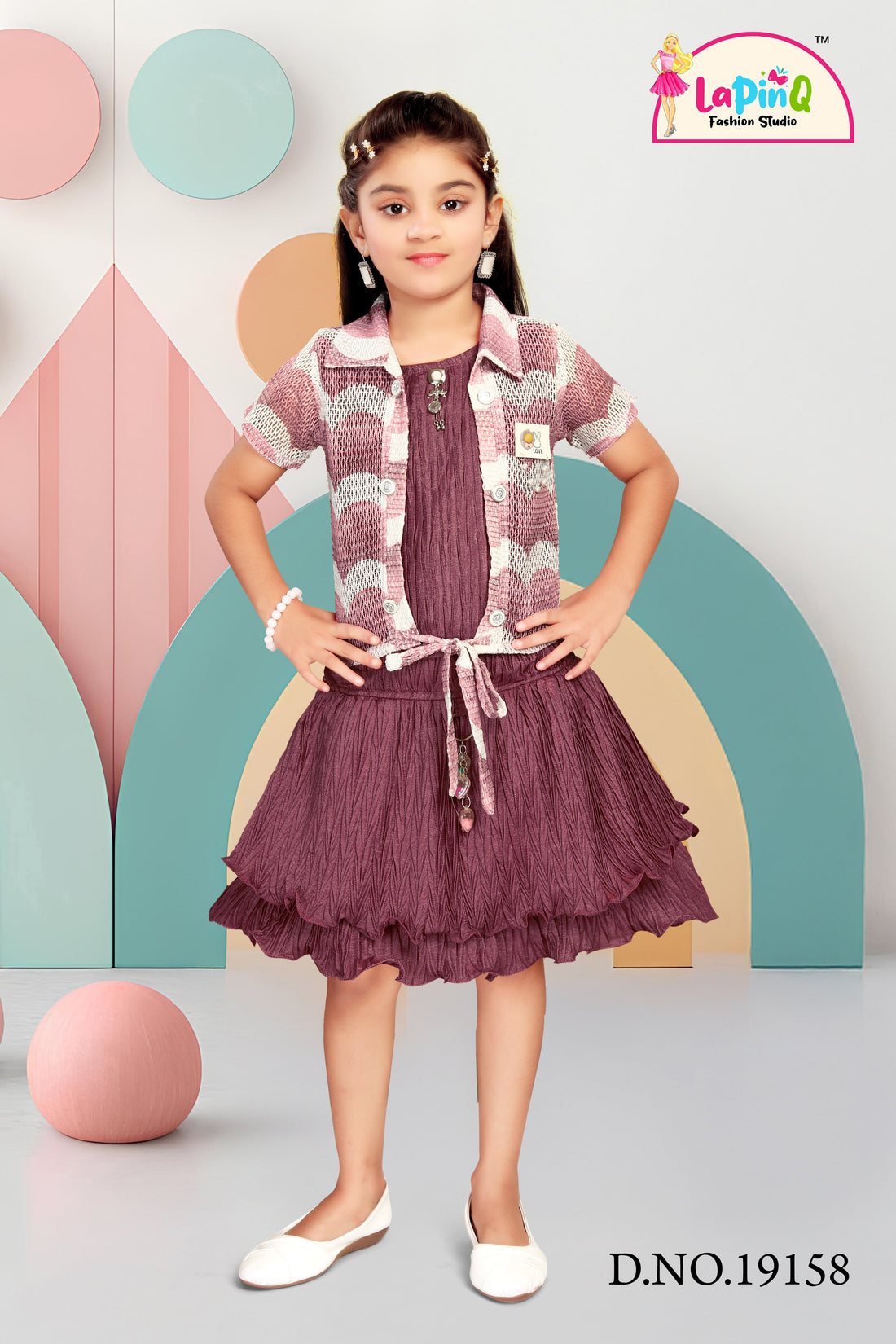 Young girl in a purple outfit with a matching jacket 